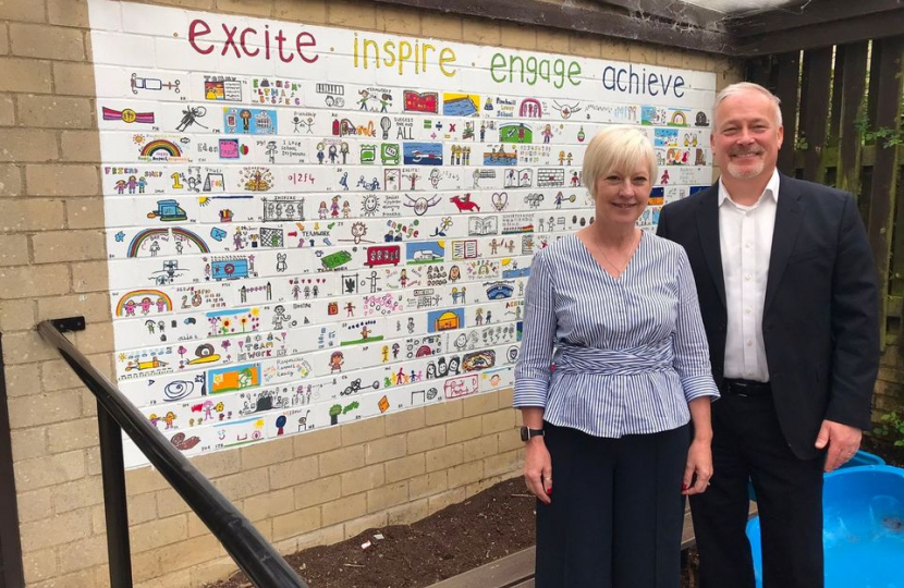 Richard Fuller with Mrs Coleman at Pinchmill Primary