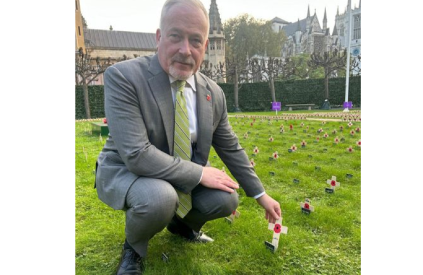 Richard planting remembrance stake