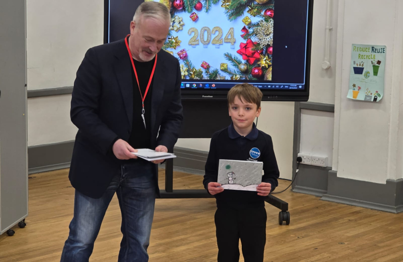 Richard with Christmas card competition winner Reggie Kidd