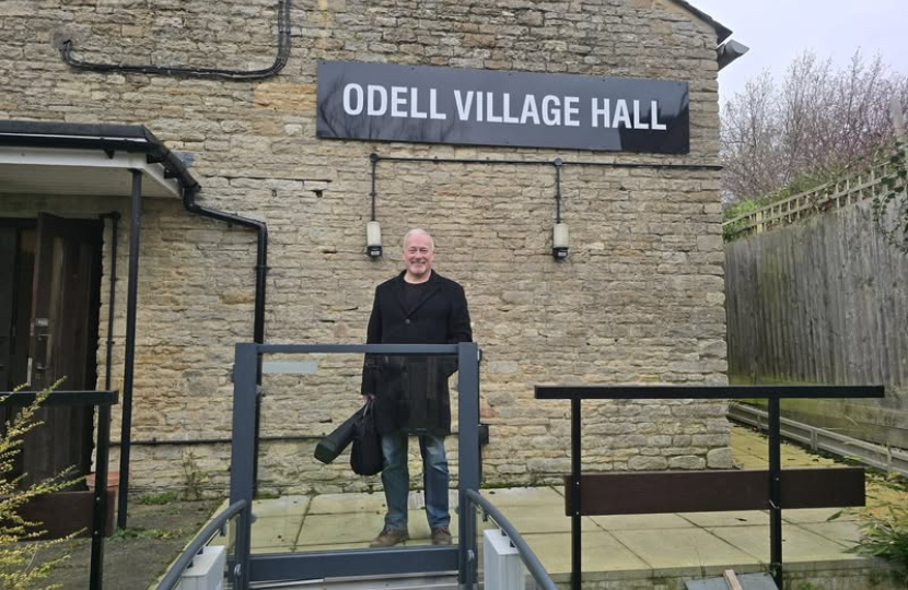 RIchard Fuller MP outside Odell Village Hall