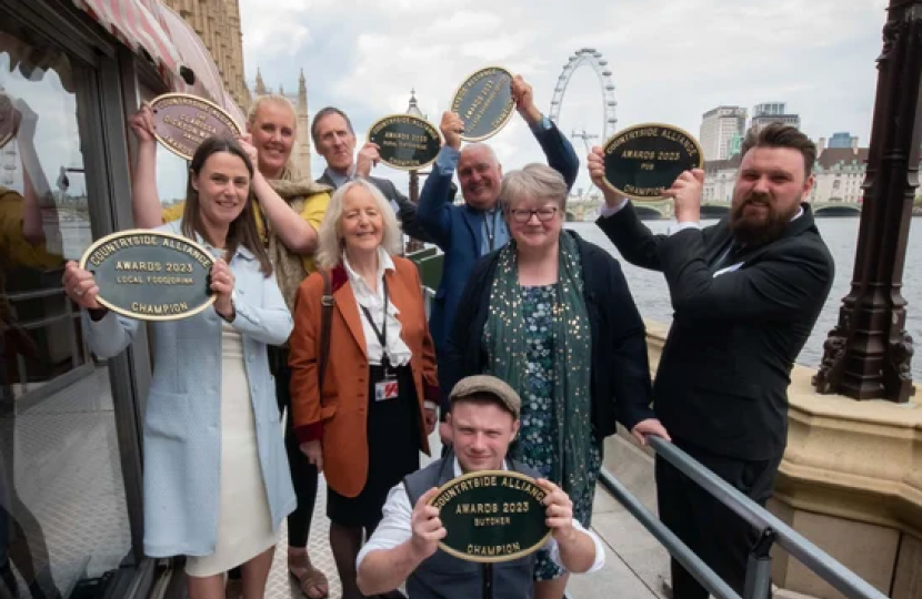 Countryside Alliance Award Winners from 2023 on the House of Commons Terrace holding their Plaques