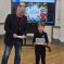 Richard with Christmas card competition winner Reggie Kidd