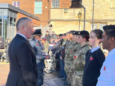 Richard speaking with cadets in the Armistice Day parade in Bedford