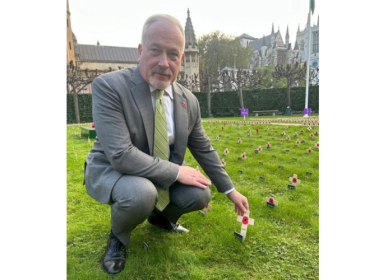 Richard planting remembrance stake