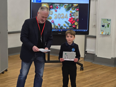 Richard with Christmas card competition winner Reggie Kidd